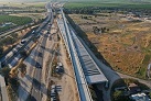 California's bullet train faces new shortfall. With Newsom quiet, will Washington save it?
